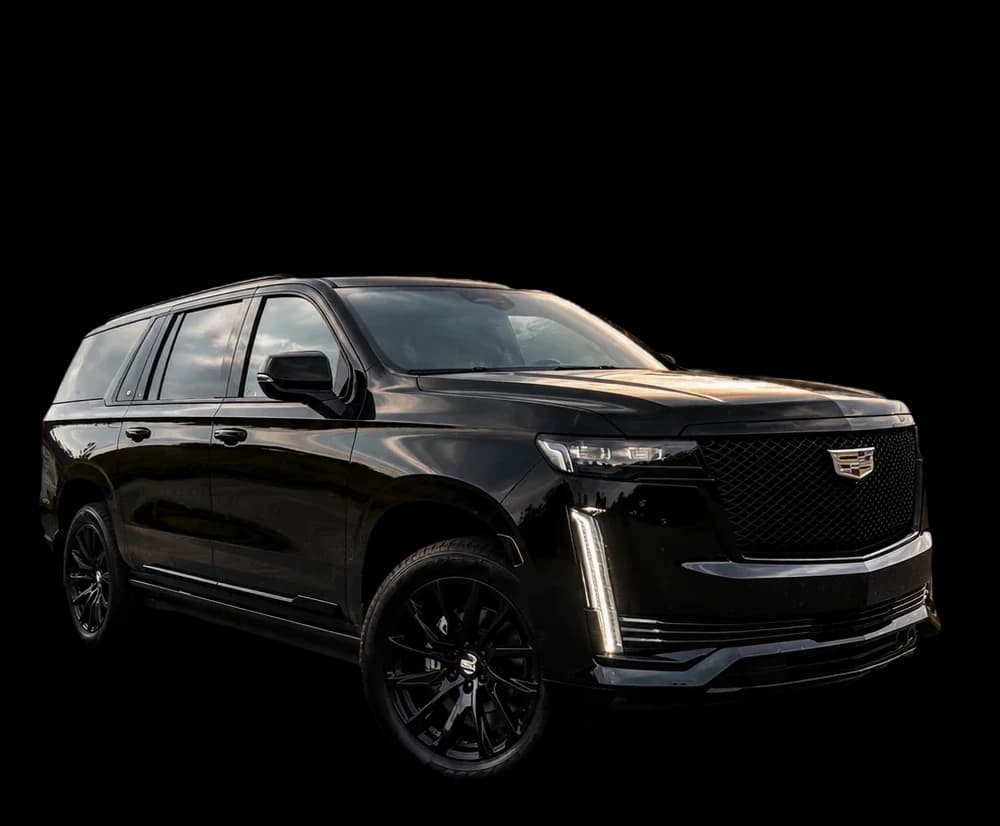 Blacked-out Cadillac Escalade, The First Class Driver